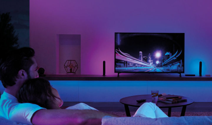 Sync your lights with your TV and the Philips Hue Play HDMI Sync Box to create seamless surround lighting.